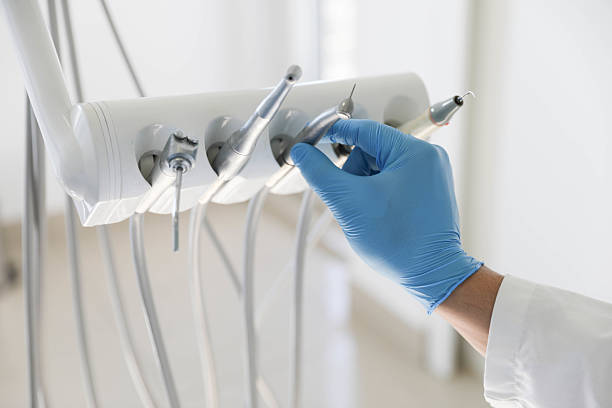Professional Tooth Extraction technician working in Kings Grant, NC